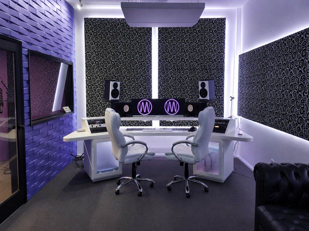 Control room desk with studio monitors and dual displays at MIX Recording Studio in Los Angeles